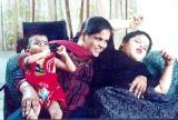 Viji with her adopted children -an old photo.jpg
