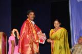 Mrs.Anuradha Giri Honours Shri Moorthy